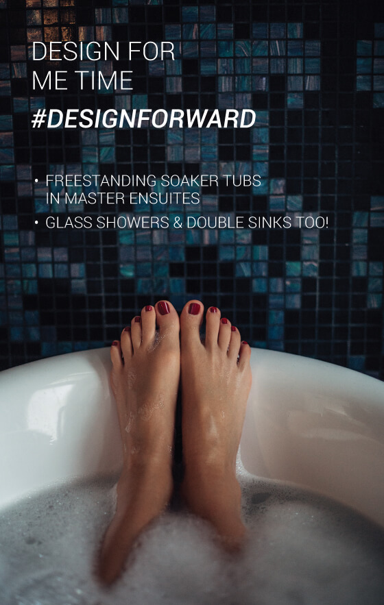 Feet exposed out of bathtub full of water